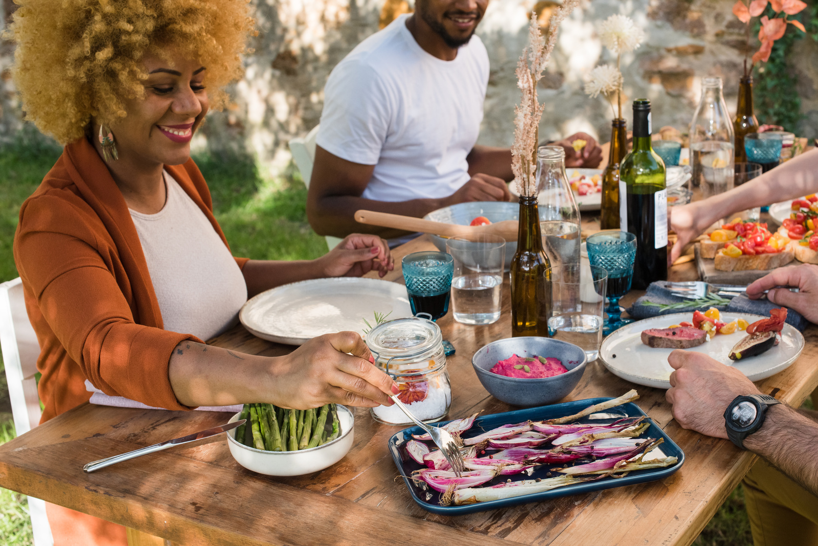 Friends Eating Food Together at the Table